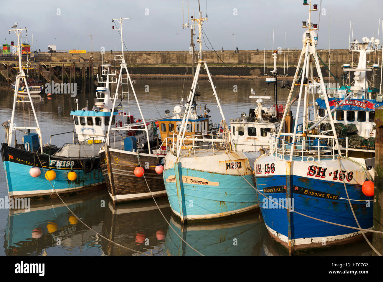 Fishing Boats moored in Bridlington Harbour North Yorkshire Coast UK Stock Photo