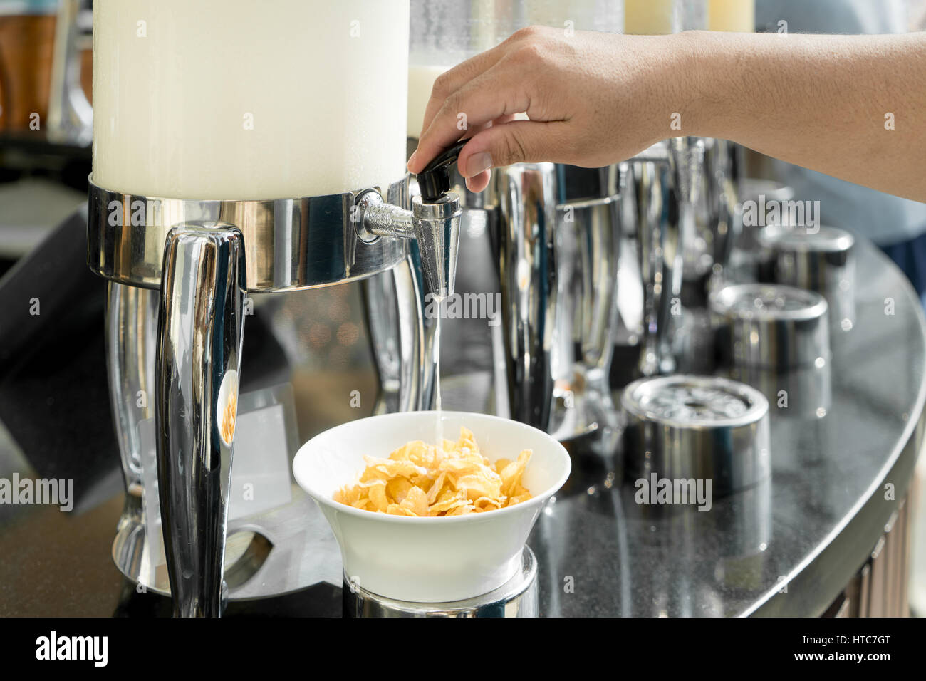 Cereals and fresh maik on the table in buffet breakfast in the restaurant. Healthy food. Stock Photo