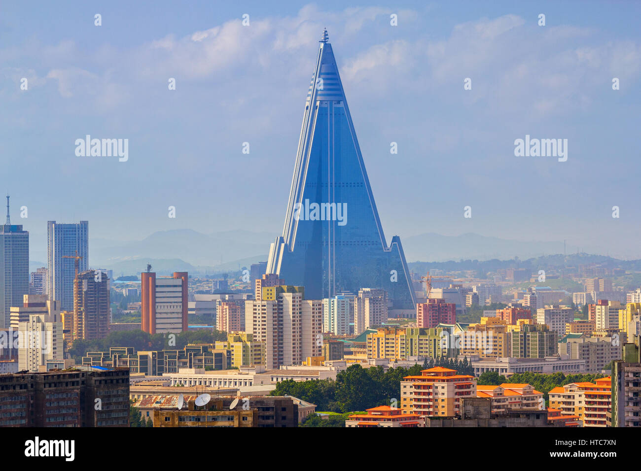 Skyline Of Pyongyang North Korea With Apartment Buildings In The Foreground And The Ryugyong Hotel In The Background Stock Photo Alamy