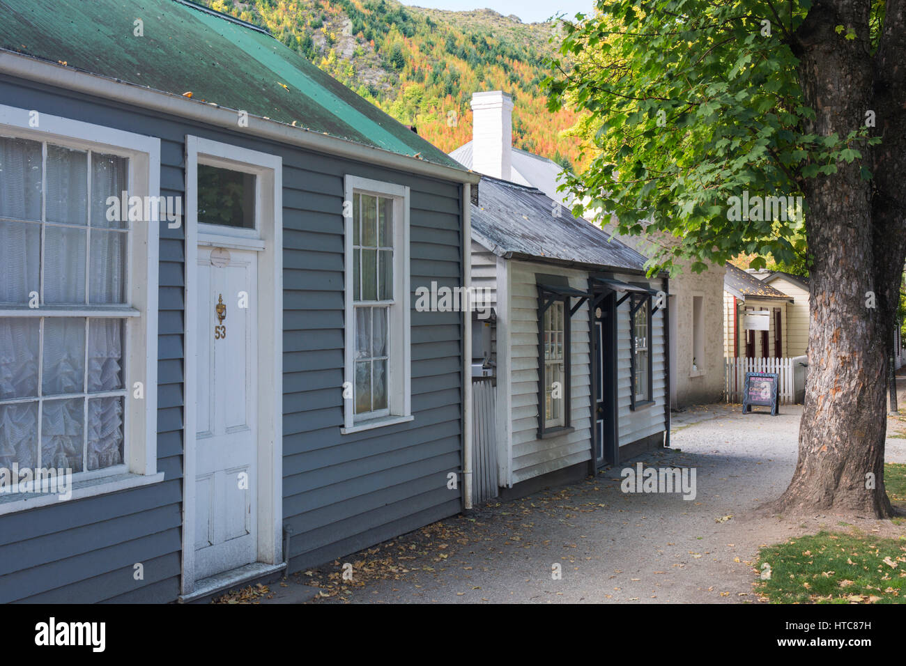 Arrowtown, Otago, New Zealand. Row of historic gold miners' cottages in Buckingham Street. Stock Photo