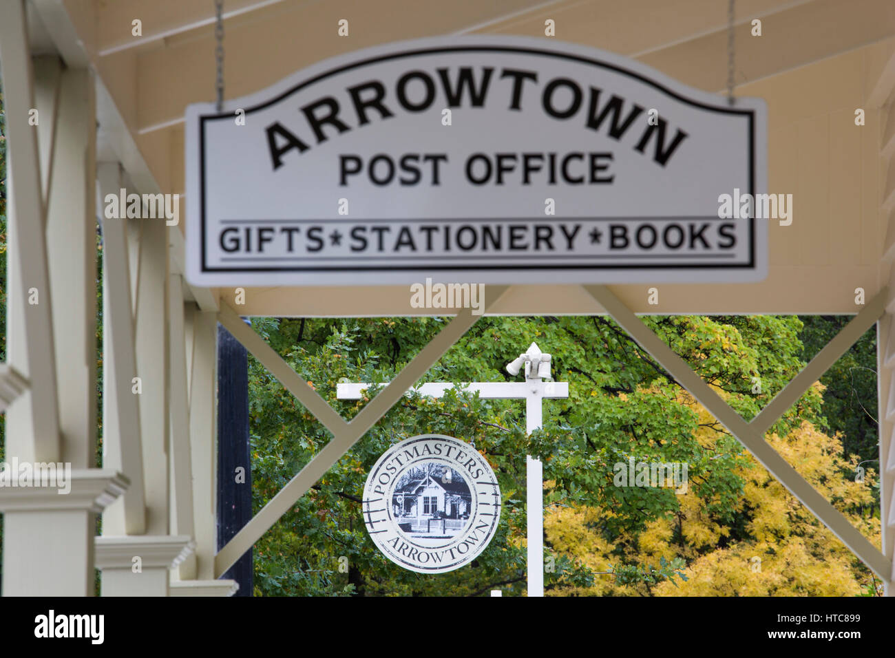 Arrowtown, Otago, New Zealand. Signs outside the Postmasters Restaurant and Arrowtown Post Office, Buckingham Street. Stock Photo