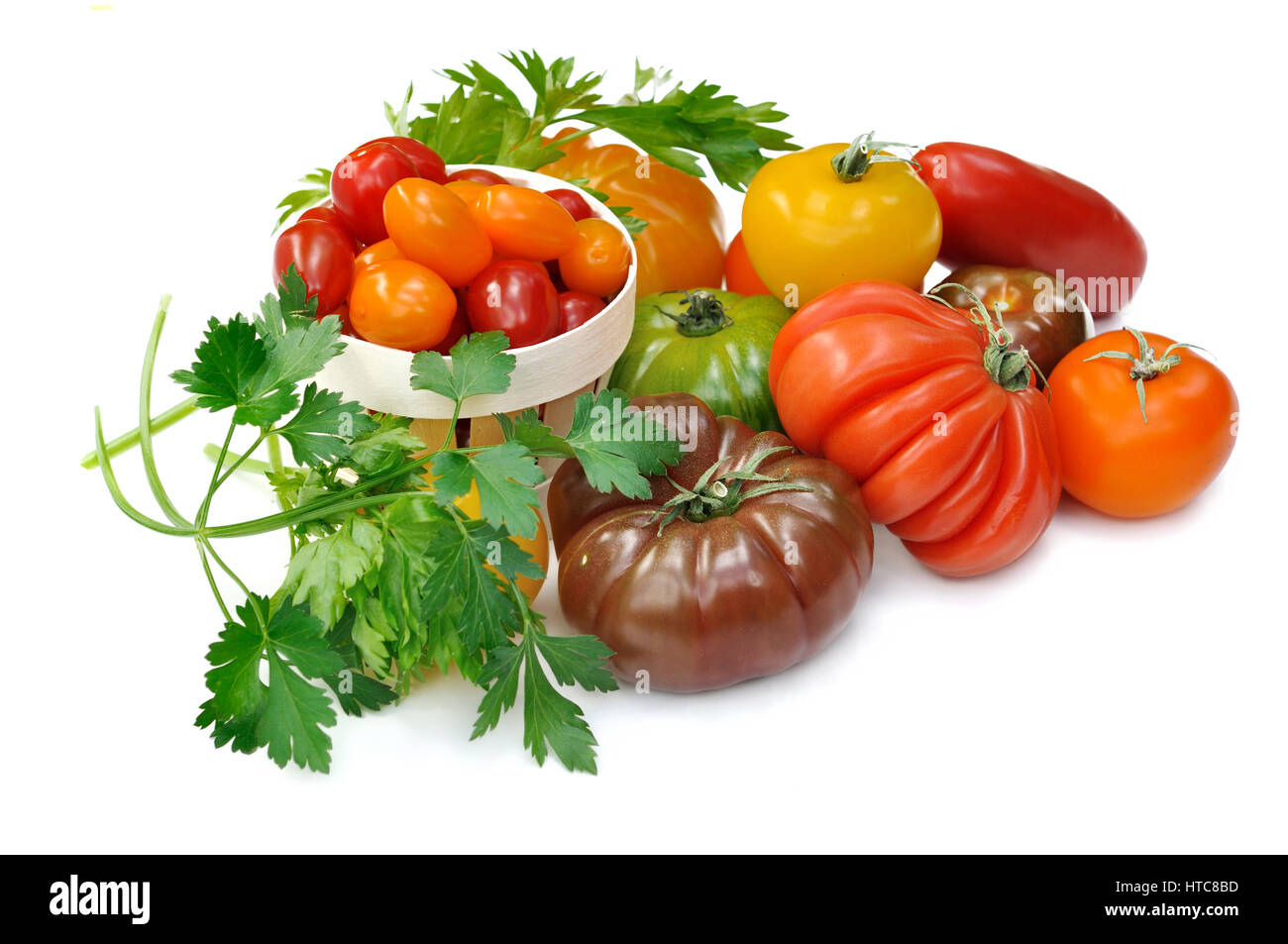 collection of tomatoes isolated on white background Stock Photo - Alamy