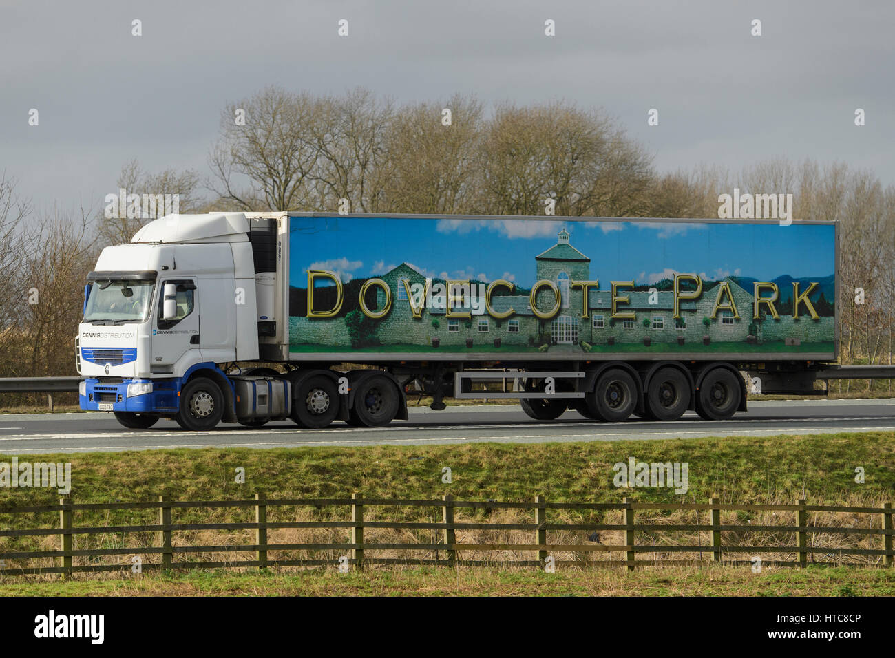 Distribution & transportation - articulated lorry, heavy goods vehicle (HGV) with Dovecote Park logo travelling on the A1 motorway - England, GB, UK. Stock Photo