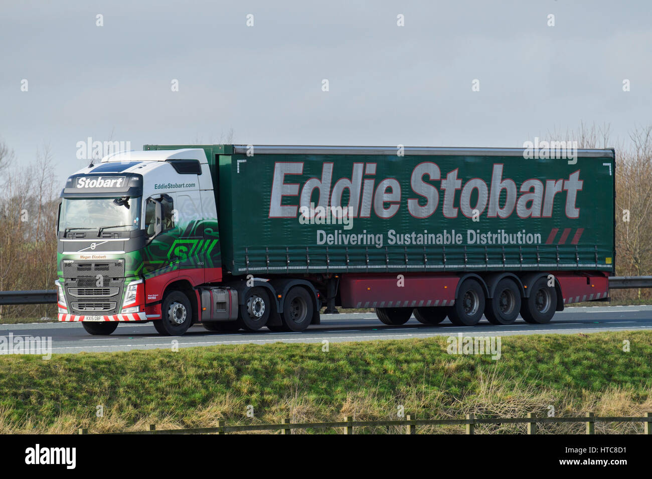 Distribution & transportation - articulated lorry, heavy goods vehicle (HGV) with Eddie Stobart logo travels on the A1 motorway - England, GB, UK. Stock Photo