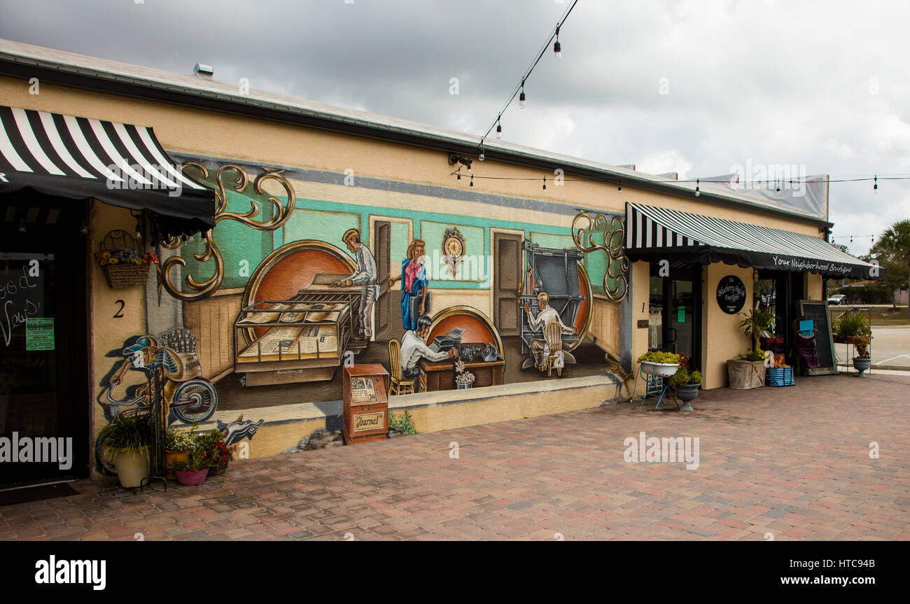 Art murals painted on outdoor building walls in Lake Placid Florida known as the Town of Murals Stock Photo