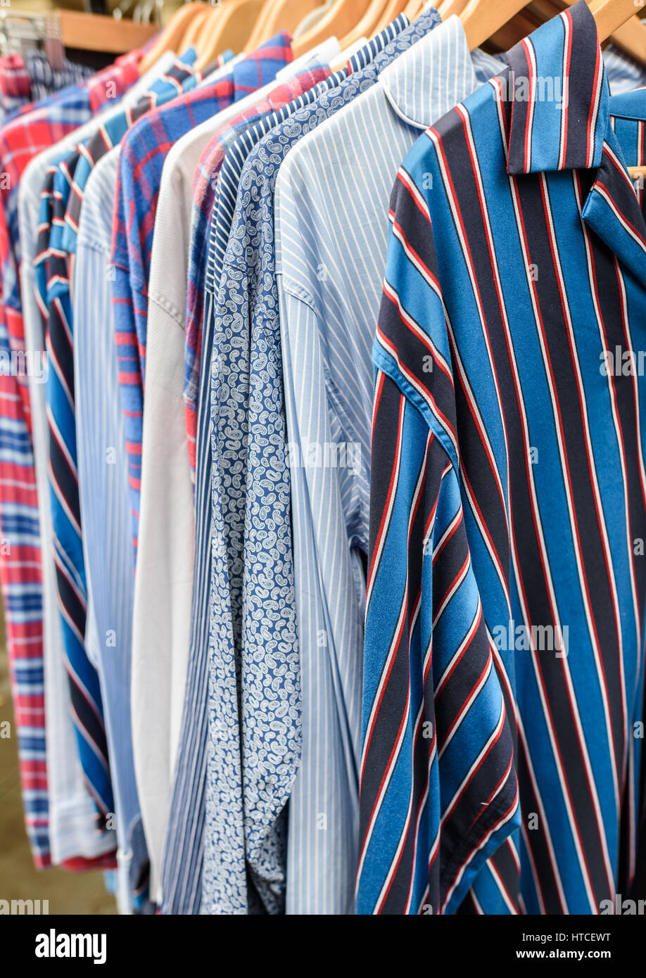 A selection of men's Pyjama shirts for sale. Stock Photo