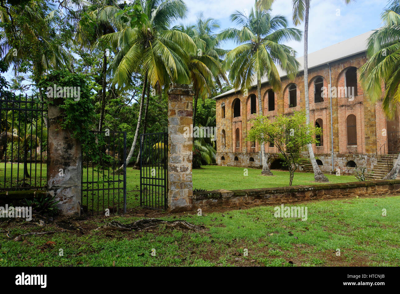 The grounds and an abandoned building of the early 1900's French penal colony on Devil's Island. Stock Photo