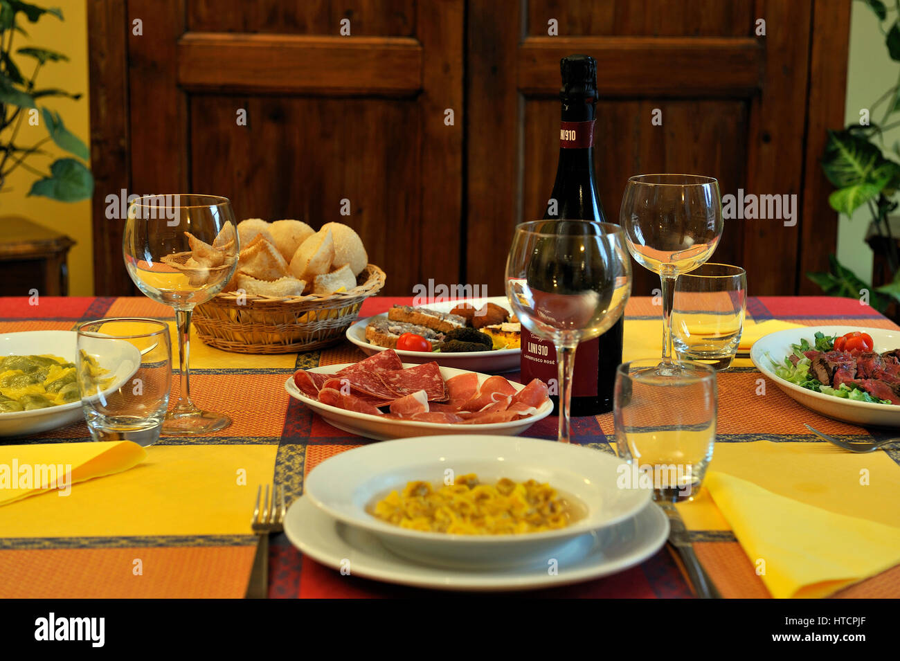Italian food on italian restaurant table Stock Photo