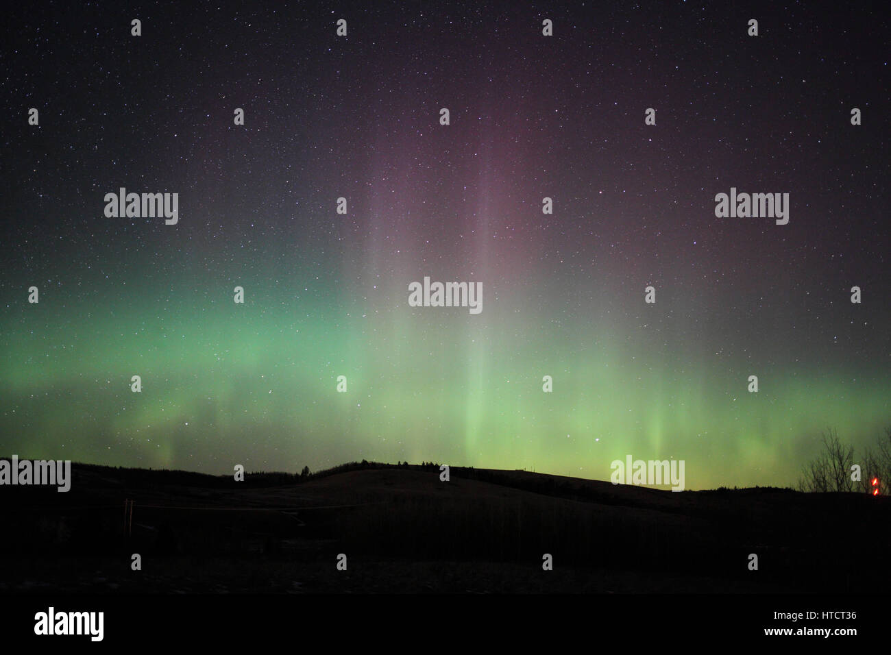 Northern lights above Albertan prairies near Cochrane Stock Photo