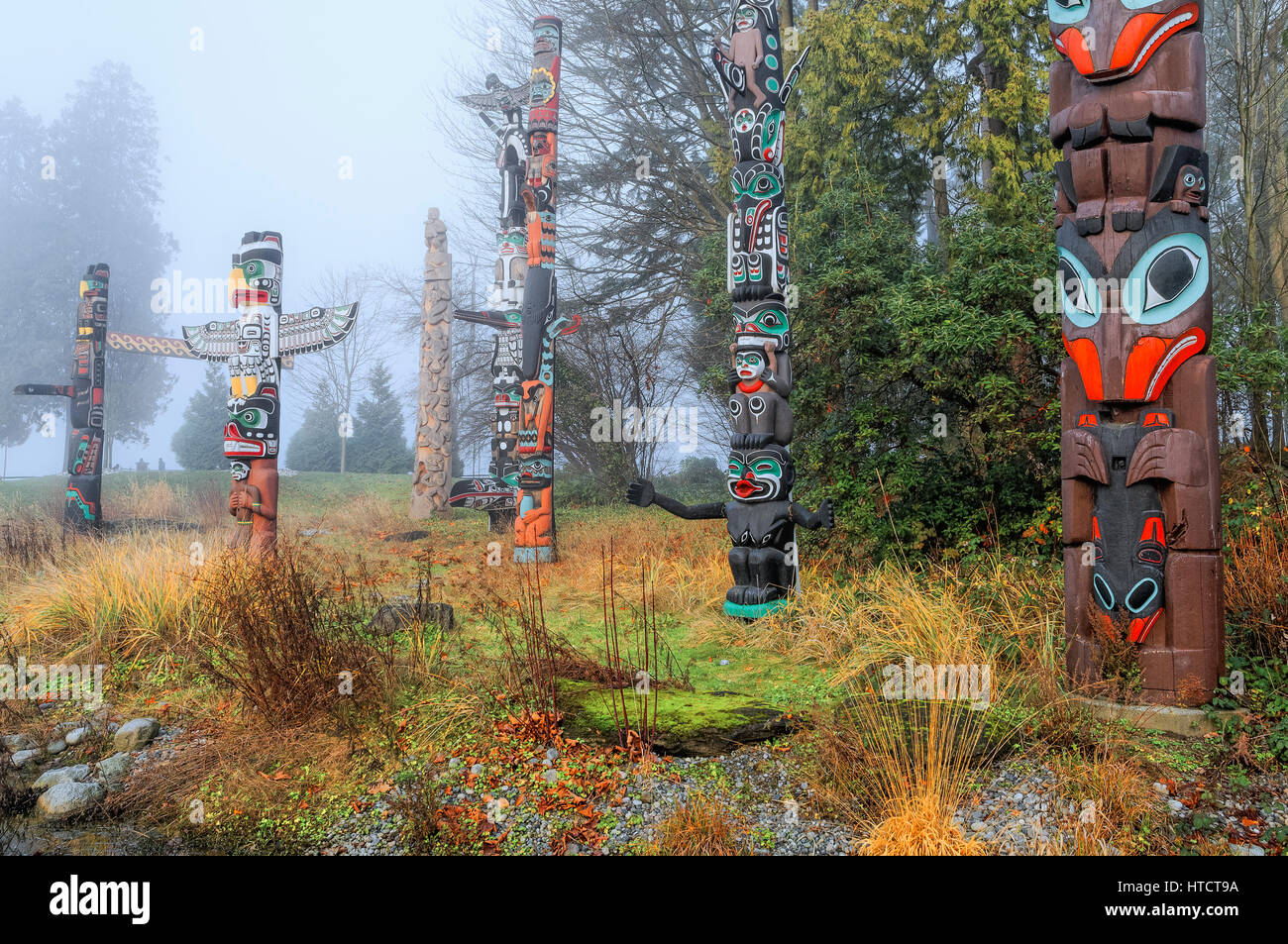 West Coast Native American totem poles at Totem Park, Brockton Point, Stanley Park, Vancouver, British Columbia Stock Photo