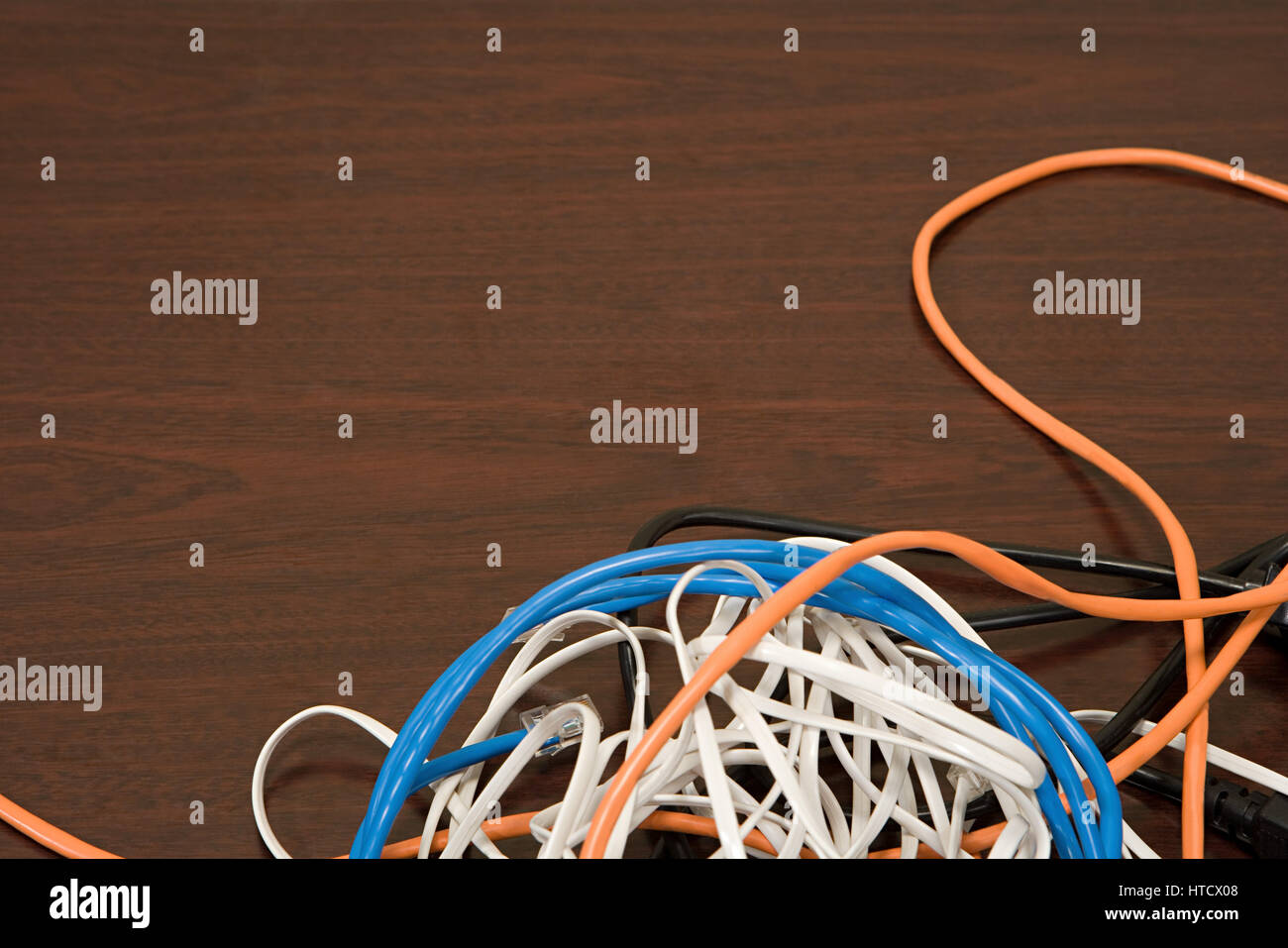 Cables on a desk Stock Photo - Alamy