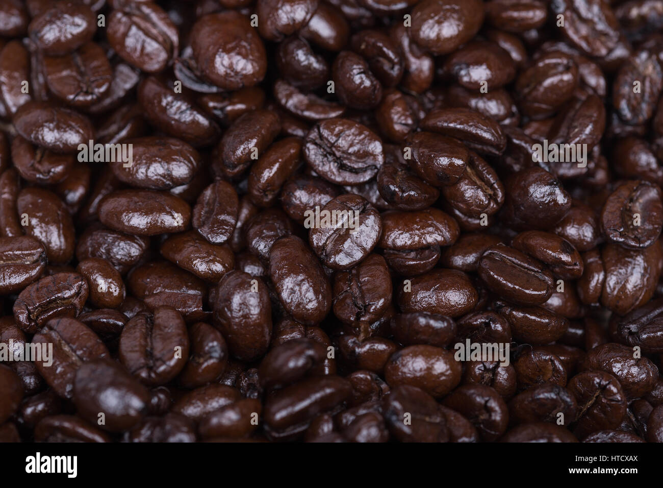 close up Roasted Coffee Beans background texture Stock Photo - Alamy