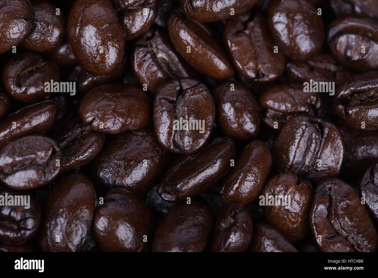 close up Roasted Coffee Beans background texture Stock Photo - Alamy