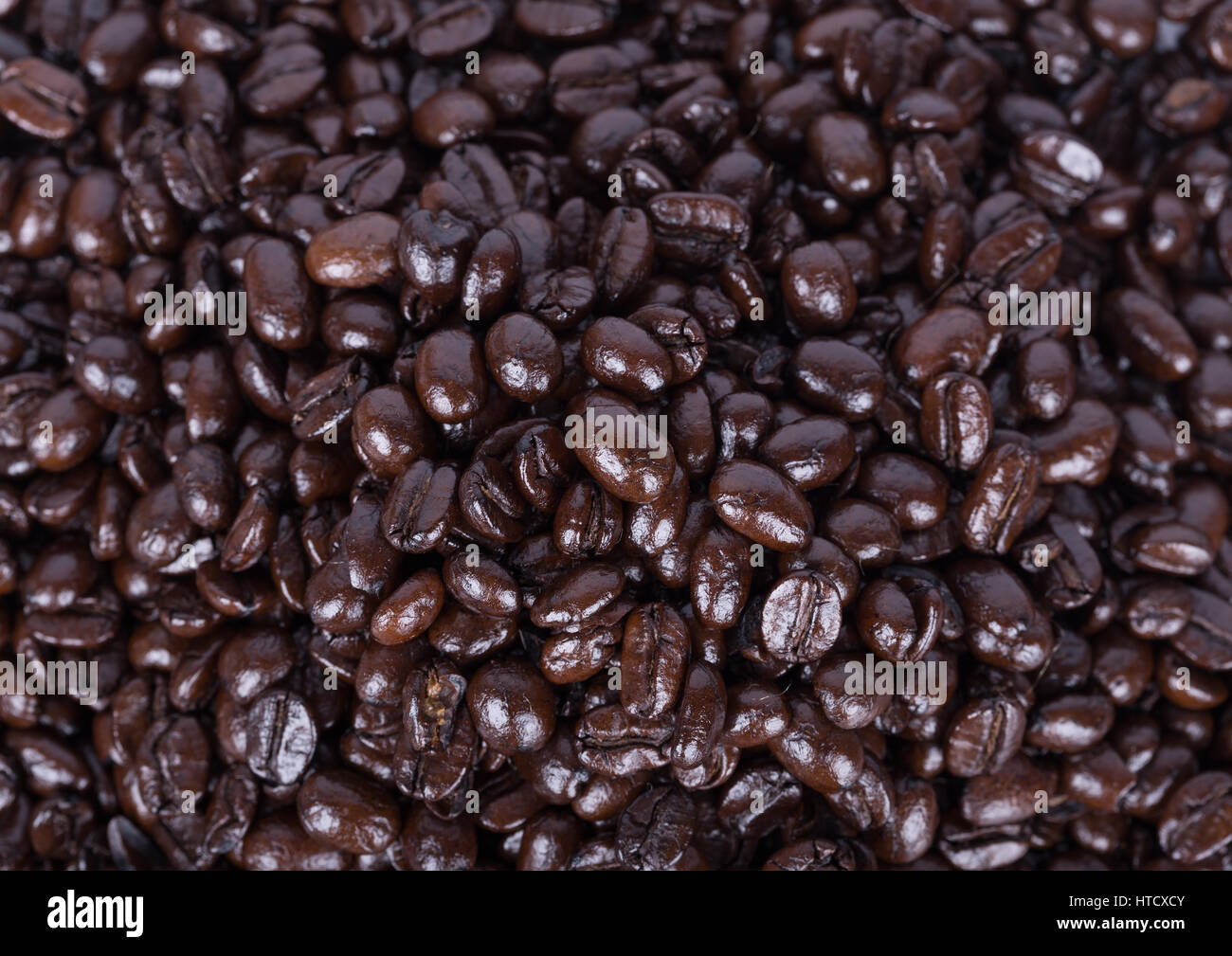 close up Roasted Coffee Beans background texture Stock Photo - Alamy