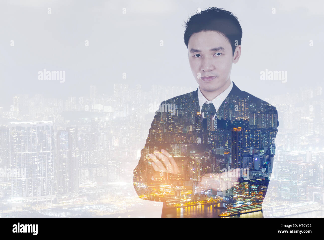 portrait of business man with arms crossed isolated on white background ...
