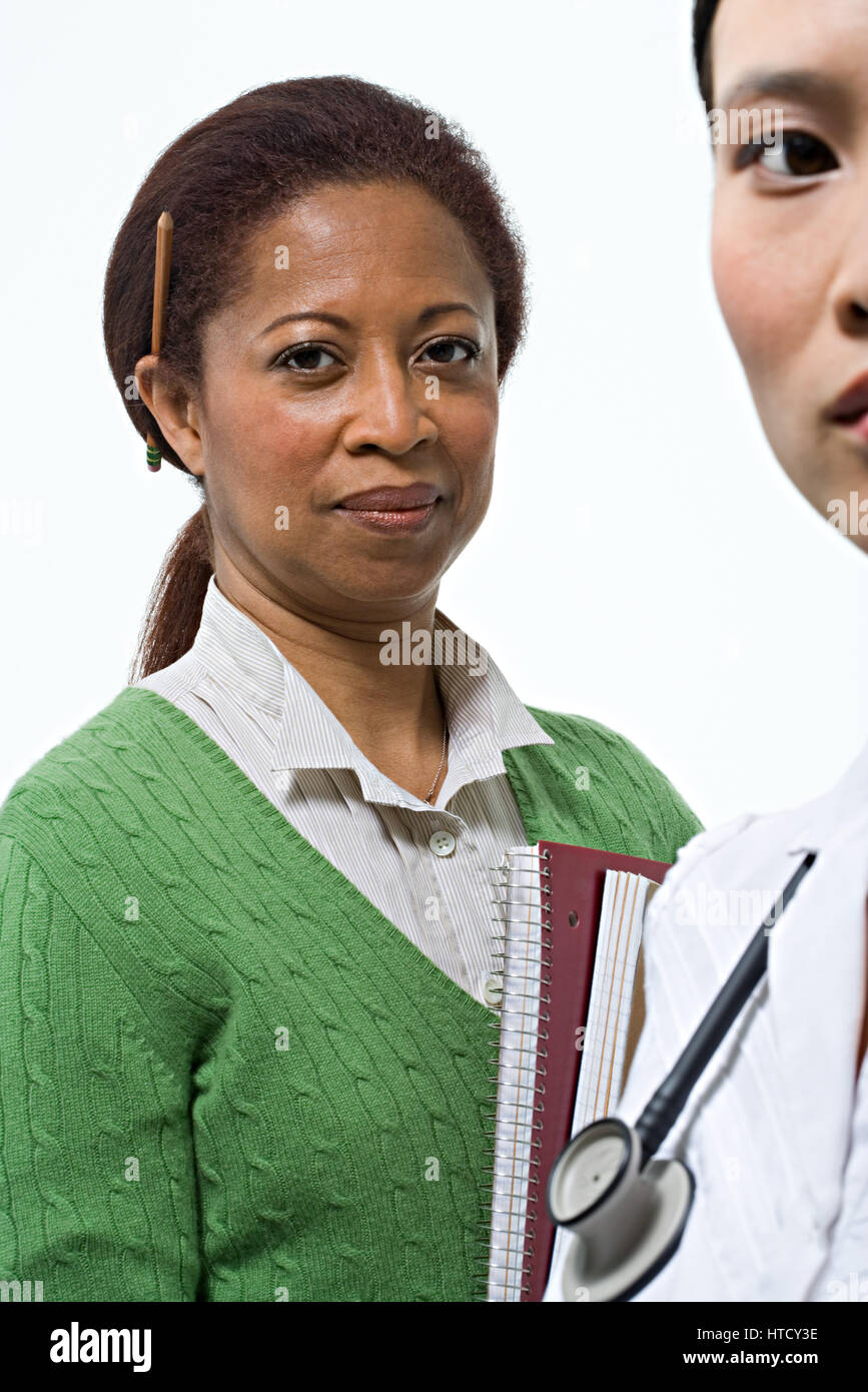 Portrait of a teacher and a nurse Stock Photo