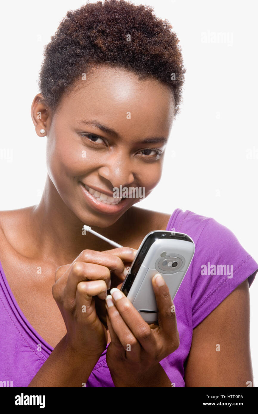 Woman using handheld computer Stock Photo Alamy