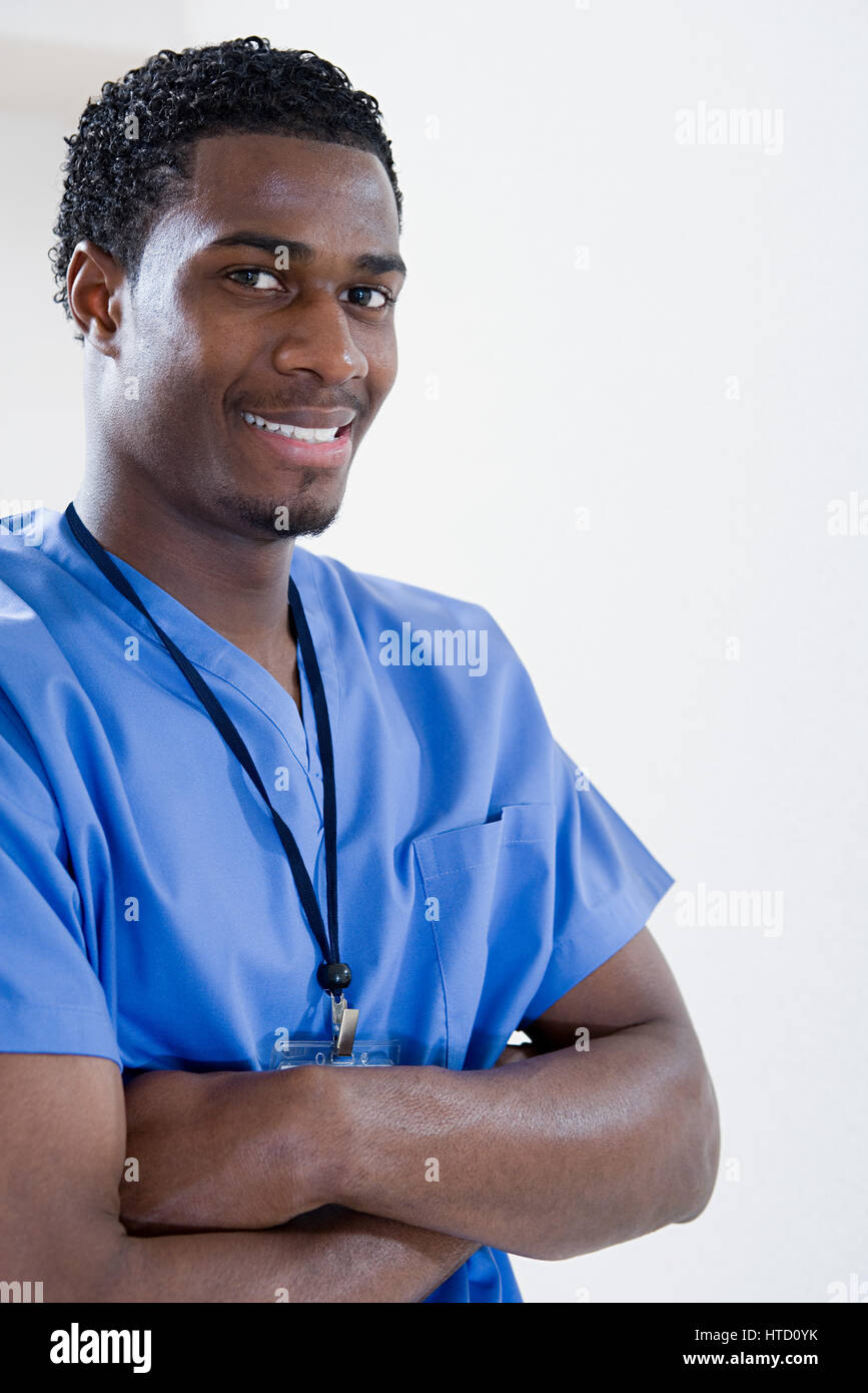Young black male nurse hi-res stock photography and images - Alamy