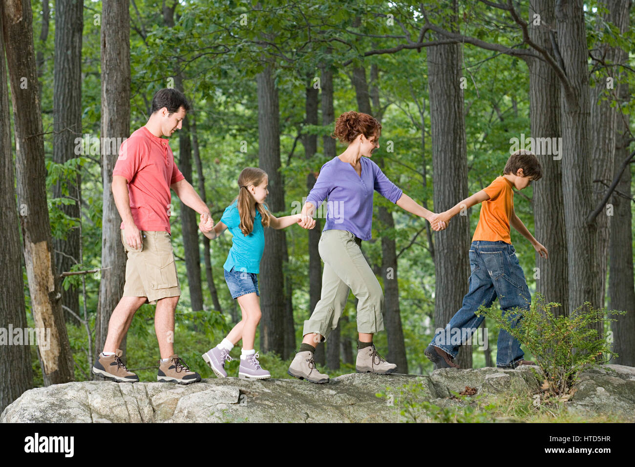 Brother sister holding hand walking hi-res stock photography and images ...