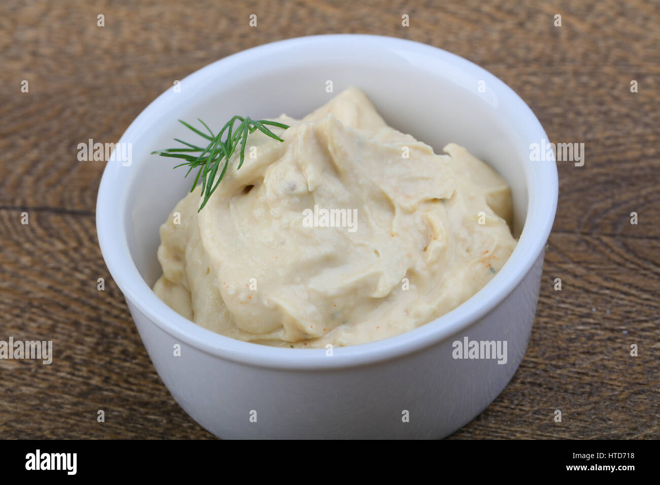 Arabic traditional cusine hummus with dill and cedar nuts Stock Photo