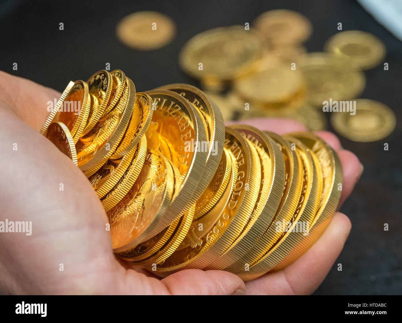 London, UK. 9th Mar, 2017. As well as standard 20p, 50p, £1, and £2 coins, the London Assay office also tests commemorative coins. Pictured here a mix of gold proof sovereign coins Credit: Guy Corbishley/Alamy Live News Stock Photo
