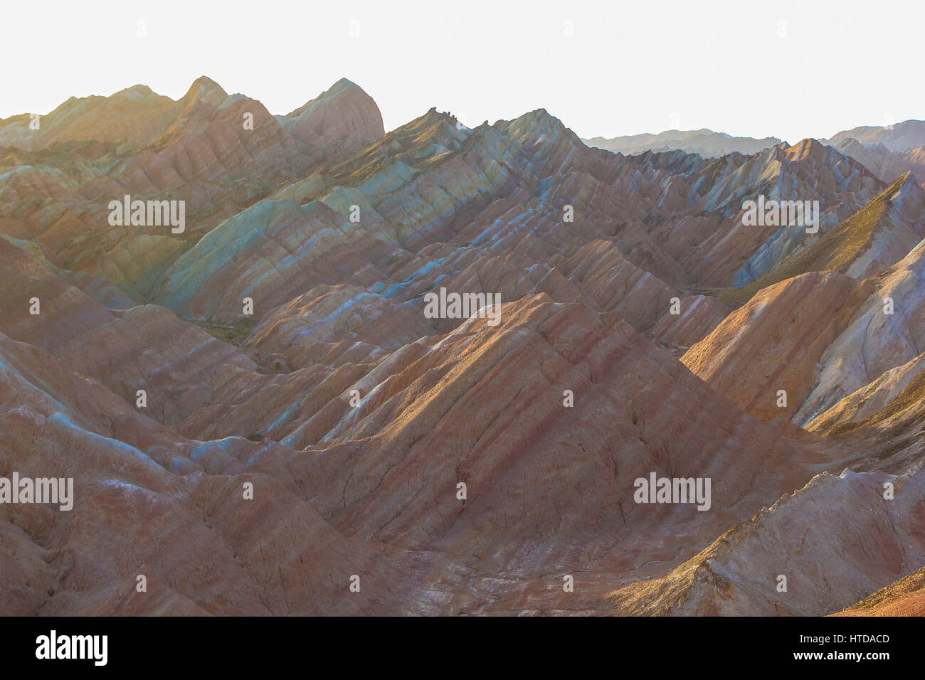 Zhangye, China. 10th Mar, 2017. Zhangye Danxia Landform Geographical Park, listed as UNESCO World Heritage Site in 2009, is located in Zhangye, northwest China's Gansu Province. Zhangye Danxia Landform is famous for the spectacular colorful mountain range of rock formation with mixed colors of red, yellow, blue, white, green. It took more than 24 million years of arduous deposition of mineral settlings with different colors to form layers. Credit: SIPA Asia/ZUMA Wire/Alamy Live News Stock Photo