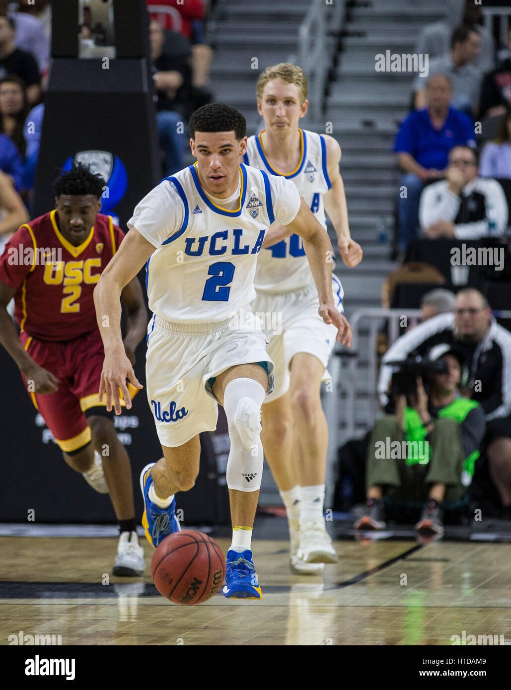 Mar 09 2017 Las Vegas, NV, U.S.A UCLA guard Lonzo Ball (2) scored 12 points, 4 rebound, 7 assist, 1 block shot and 1 steal brings the ball up court during the NCAA Pac 12 Men's Basketball Tournament between UCLA Bruins and USC Trojans 76-74 win at T Mobile Arena Las Vegas, NV. Thurman James/CSM Stock Photo