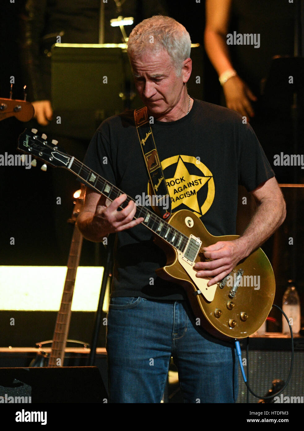 NEW YORK, NY - March 9 : John McEnroe performs on stage at 'Love Rocks NYC! A Change is Gonna Come: Celebrating Songs of Peace, Love and Hope' A Benefit Concert for God's Love We Deliver at Beacon Theatre on March 9, 2017 in New York City. @John Palmer/Media Punch Stock Photo