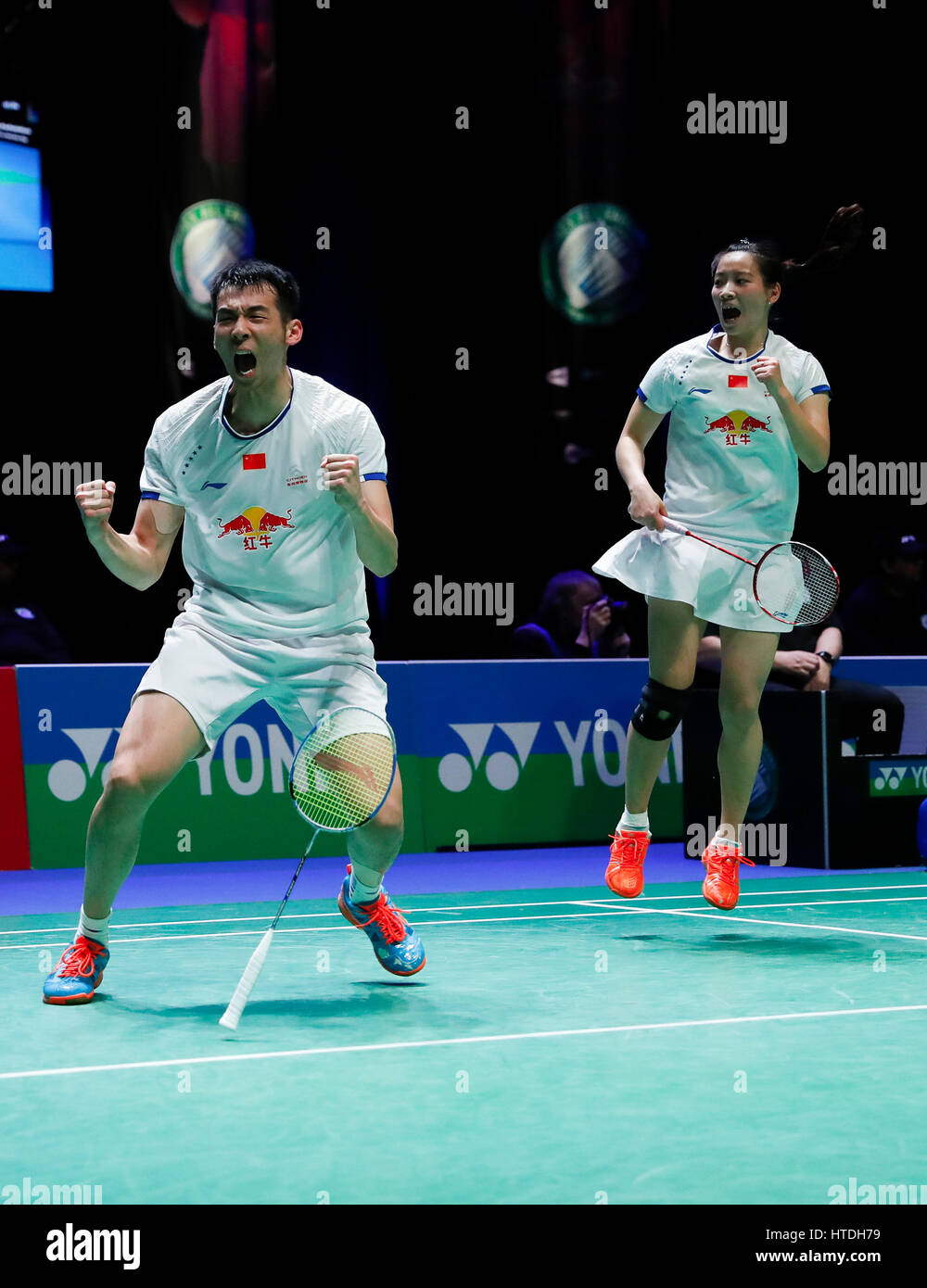 Birmingham. 10th Mar, 2017. Lu Kai(L)and Huang Yaqiong of China celebrate after the mixed doubles quarterfinal with Joachim Fischer Nielsen and Christinna Pedersen of Denmark at All England Open Badminton 2017 in Birmingham, Britain on March 10, 2017. Credit: Han Yan/Xinhua/Alamy Live News Stock Photo
