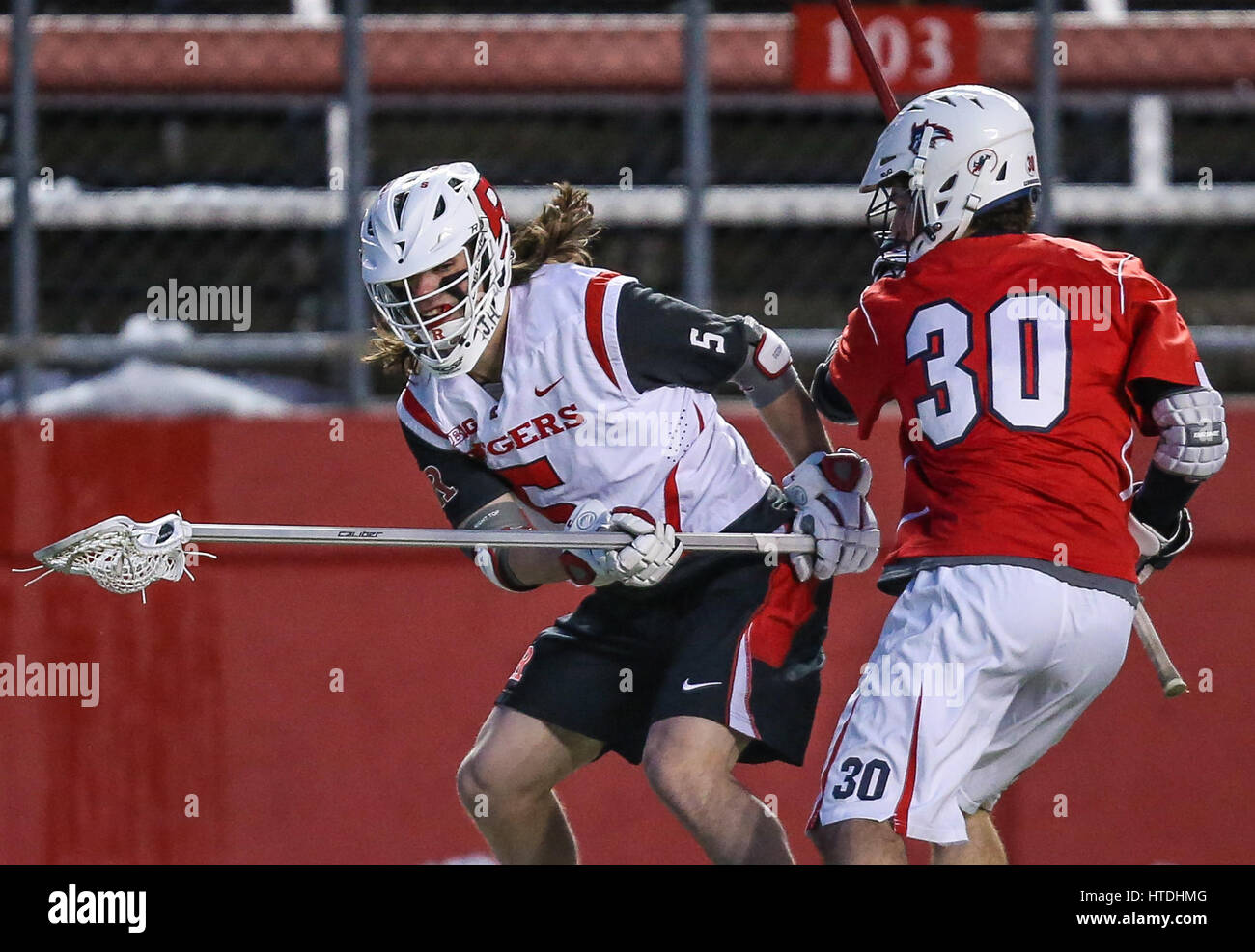 Piscataway, NJ, USA. 10th Mar, 2017. Rutgers Kyle Pless (5) and Stony