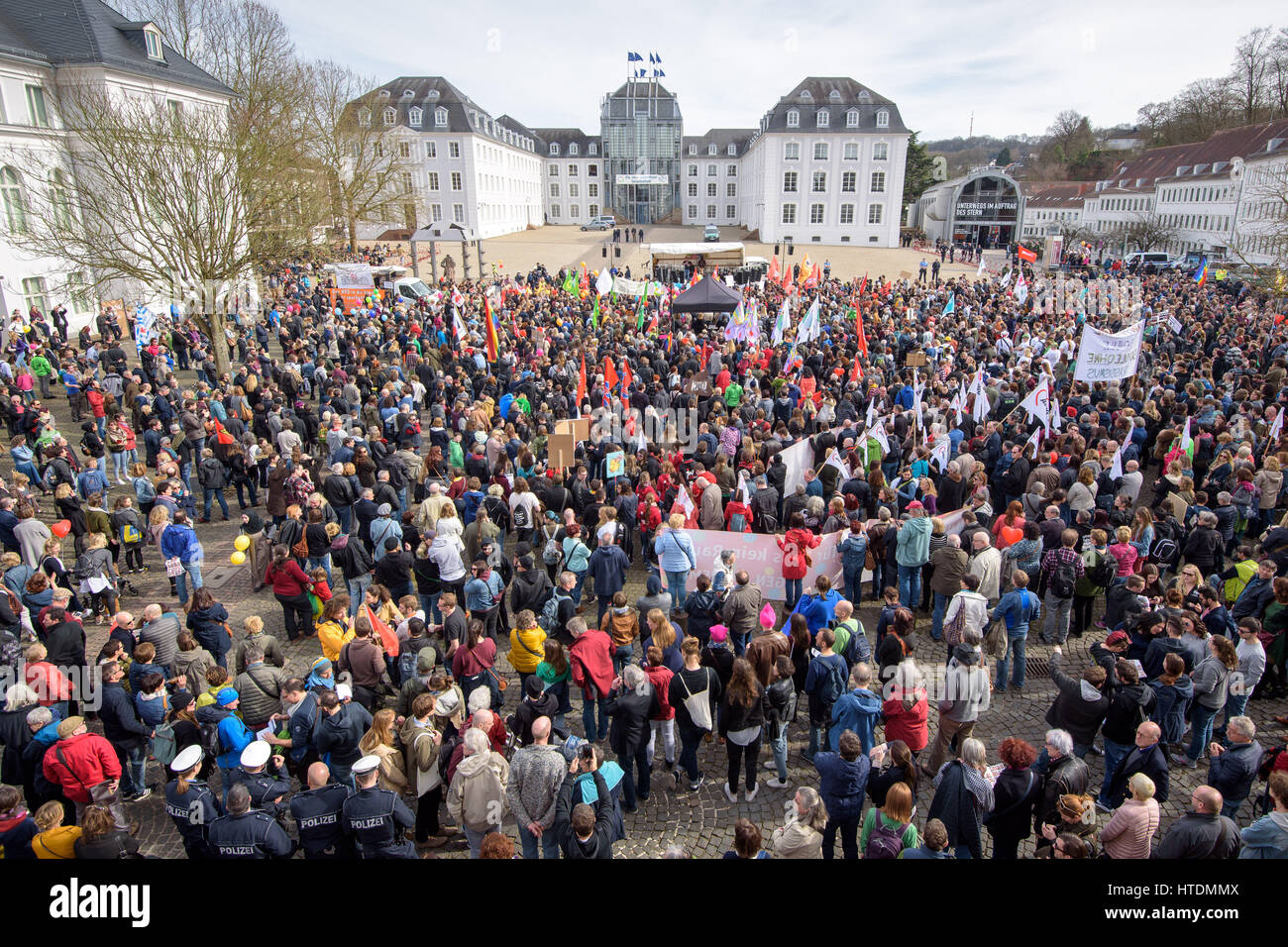 Saarbruecken, Germany. 11th Mar, 2017. Around 4,000 people demonstrated against the German NPD (German National Party) party conference, which was taking place in the town castle in Saarbruecken, Germany, 11 March 2017. The event was organised by the German group 'Bunt statt Braun'. Photo: Oliver Dietze/Oliver Dietze/dpa/dpa/Alamy Live News Stock Photo