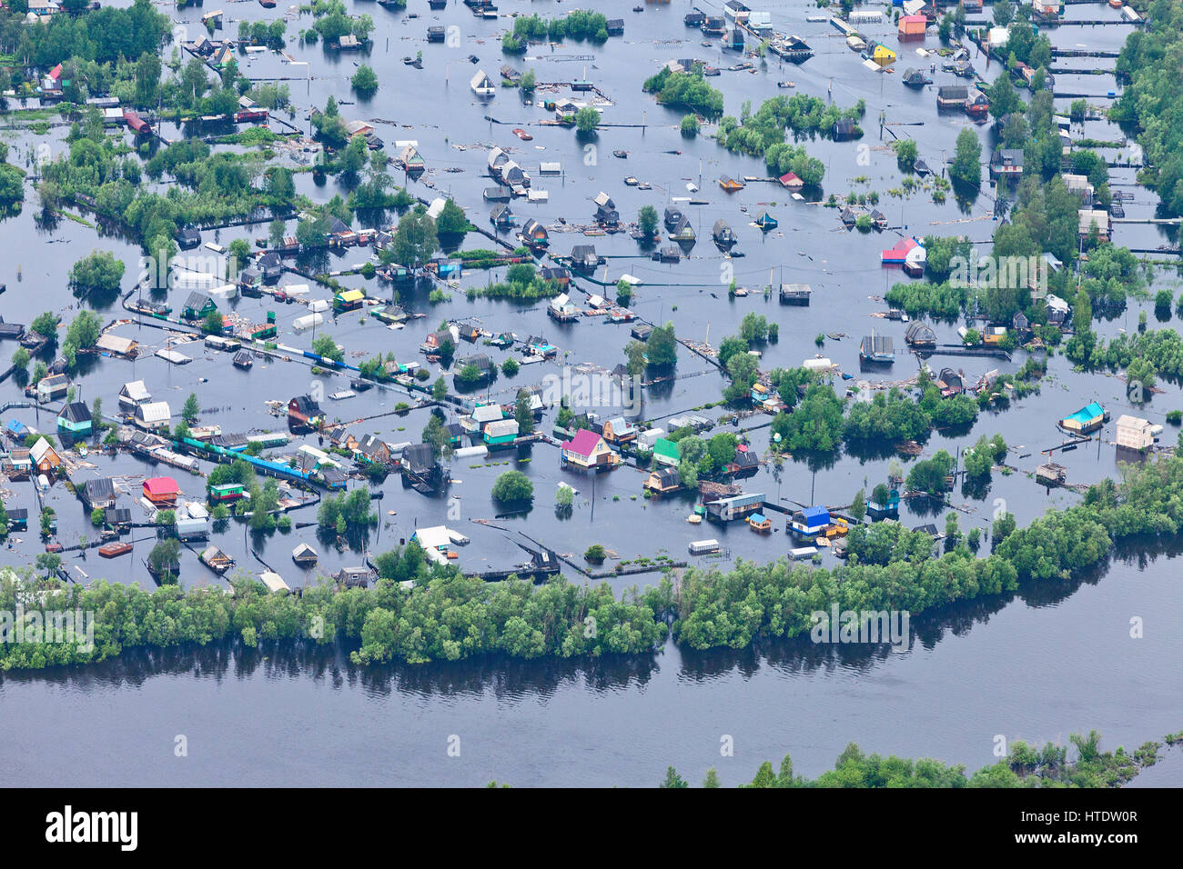 Flooded village in lowland of Great river Stock Photo