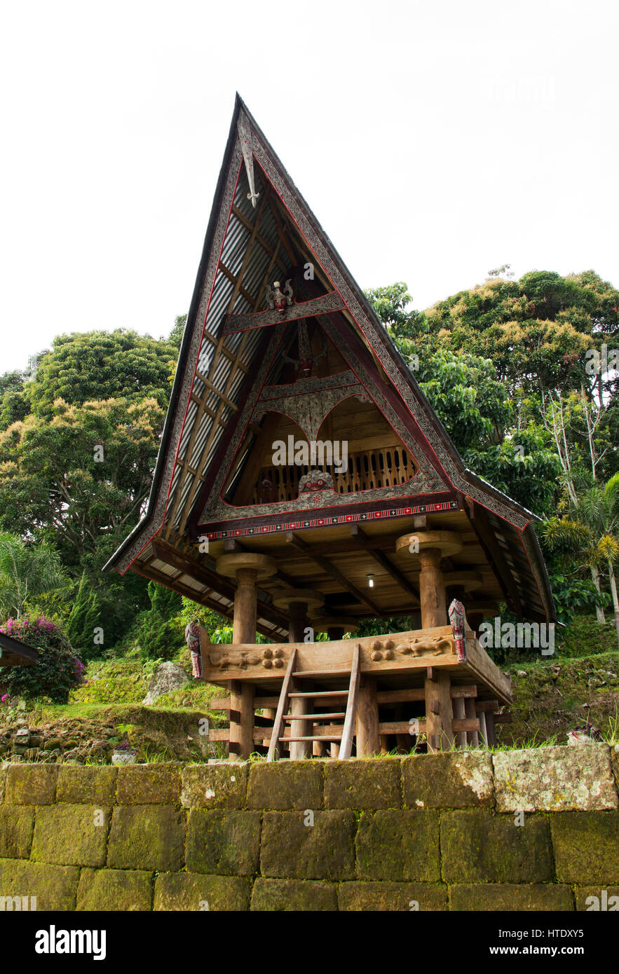 Front of a house at an old Batak village in Sumatra Samosir Island in the afternoon, Indonesia. Stock Photo