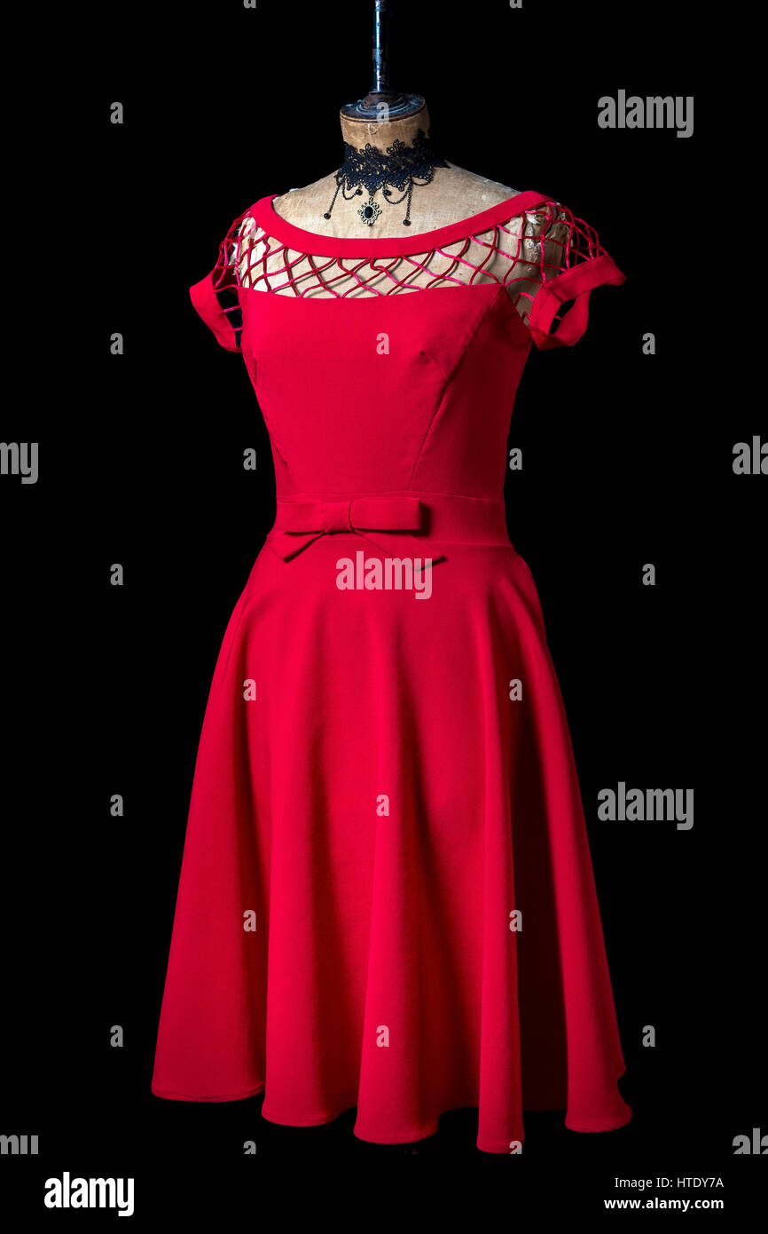 Red dress on a vintage mannequin Stock Photo Alamy