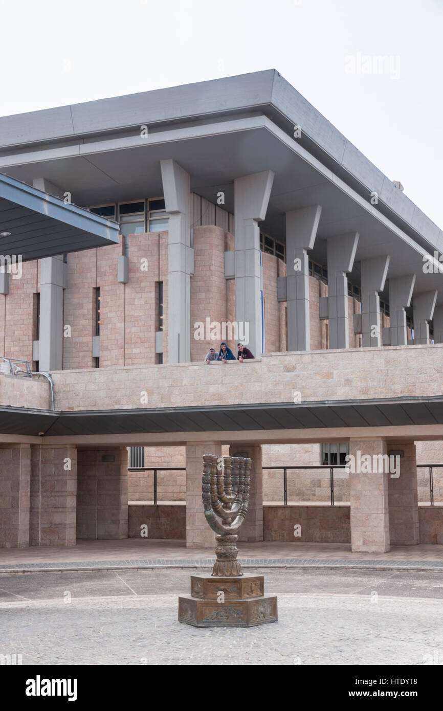 The Knesset (the Israeli parliament), Jerusalem. A Menora (Jewish candelabra), a symbol of the state of Israel, stands in front of the building Stock Photo