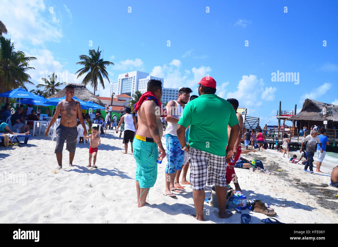 locals on beach in cancun mexico Stock Photo Alamy