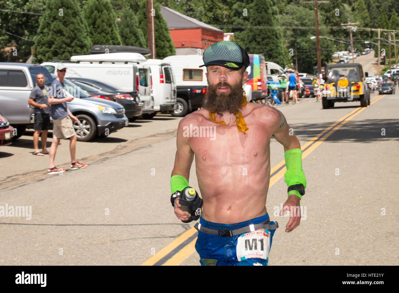 Elite ultra-marathon runner Rob Krar running in the Western States 100-mile Endurance Run.  Western States is one of the oldest and most popular ultra Stock Photo