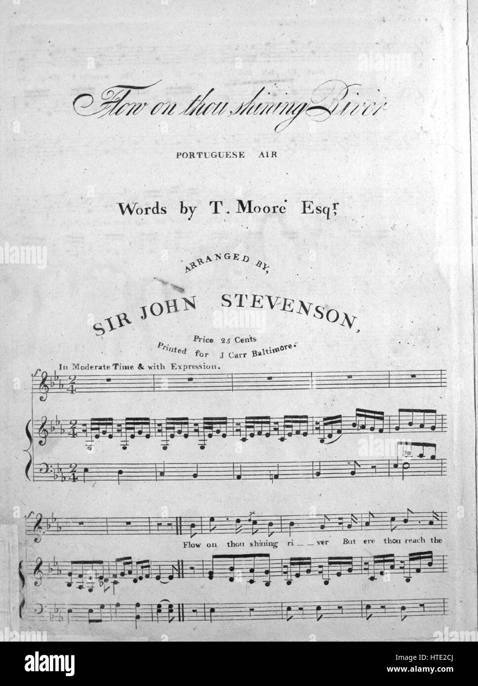 Sheet music cover image of the song 'Flow on thous shining River Portuguese Air', with original authorship notes reading 'Words by T Moore, Esqr; Arranged by Sir John Stevenson', United States, 1900. The publisher is listed as 'Carr's Music Store', the form of composition is 'strophic with chorus', the instrumentation is 'piano and voice', the first line reads 'Flow on thou shining river But ere thou reach the sea', and the illustration artist is listed as 'None'. Stock Photo