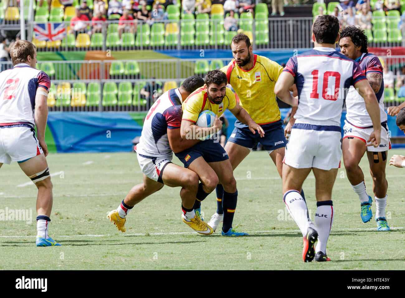 Rio de Janeiro, Brazil. 11 August 2016 Javier Carrion  (ESP) being tackled by Martin Iosefothe (USA) in Men's  Rugby Sevens at the 2016 Olympic Summer Stock Photo