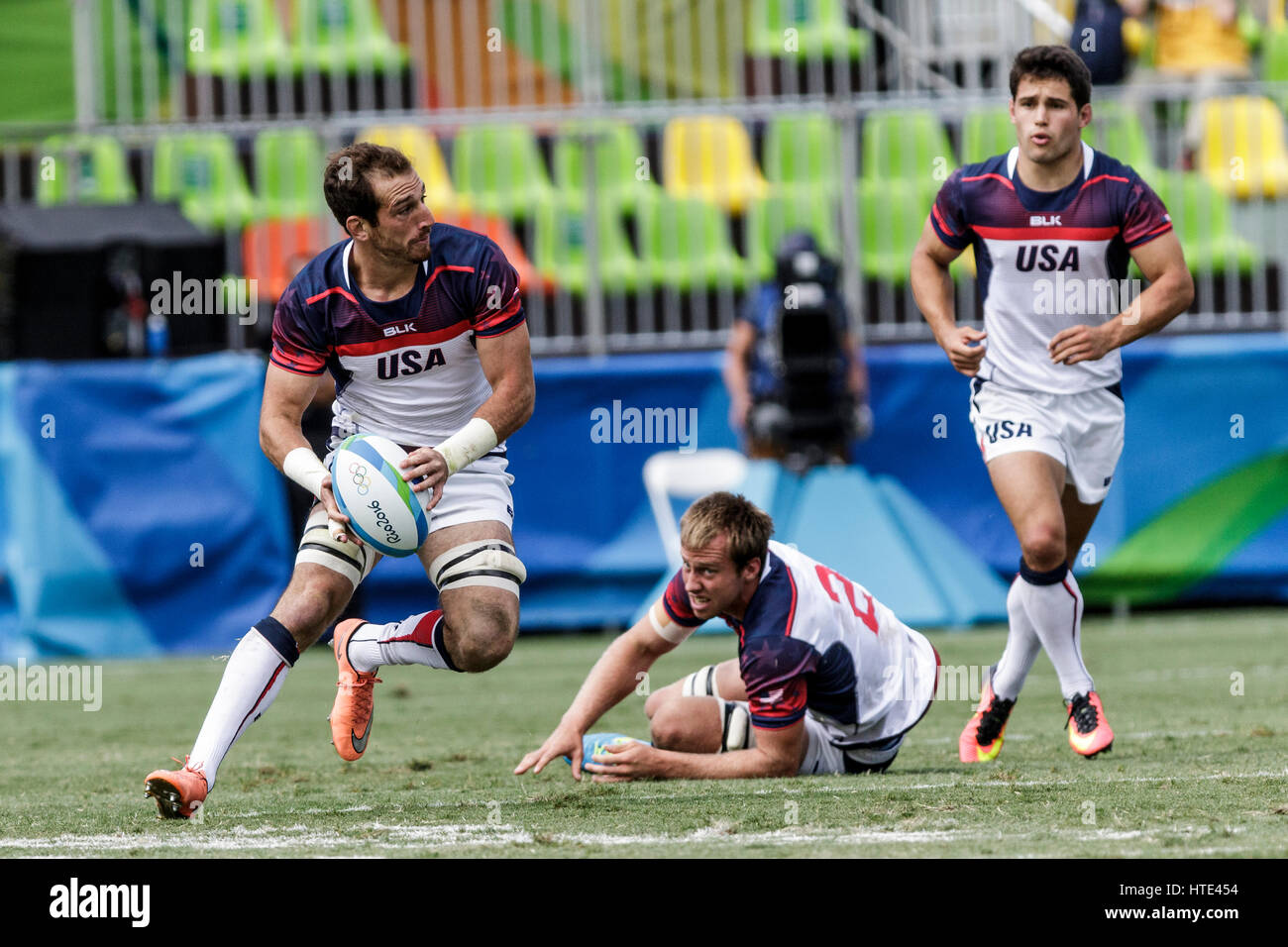 Rio de Janeiro, Brazil. 11 August 2016 Zack Test (USA), with ball,  competes in the Men's  Rugby Sevens in a match vs. Spain at the 2016 Olympic Summe Stock Photo