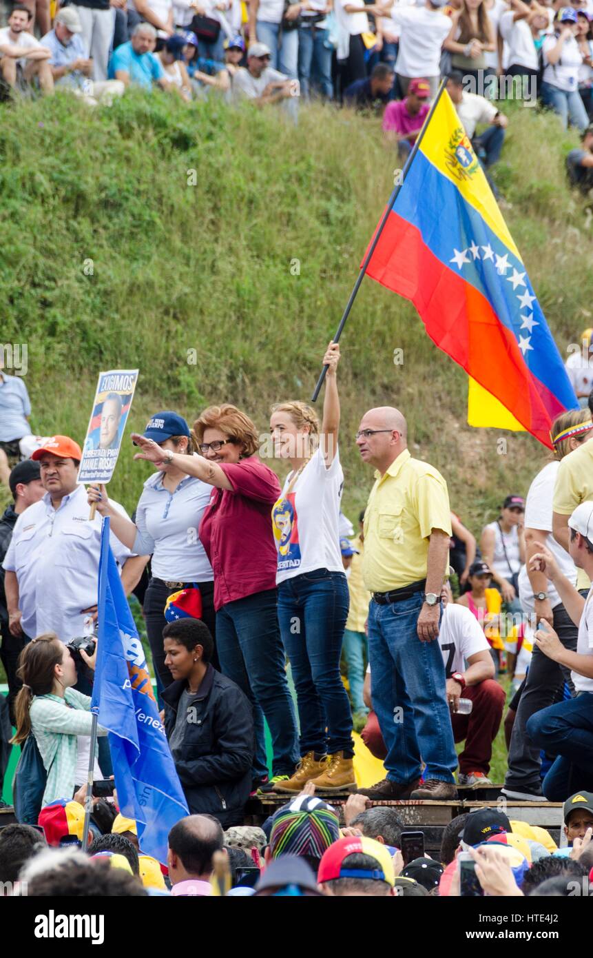 Lilian Tintori, wife of prominent jailed opposition leader Leopoldo Lopez, waves a Venezuelan national flag during a rally against the government of P Stock Photo