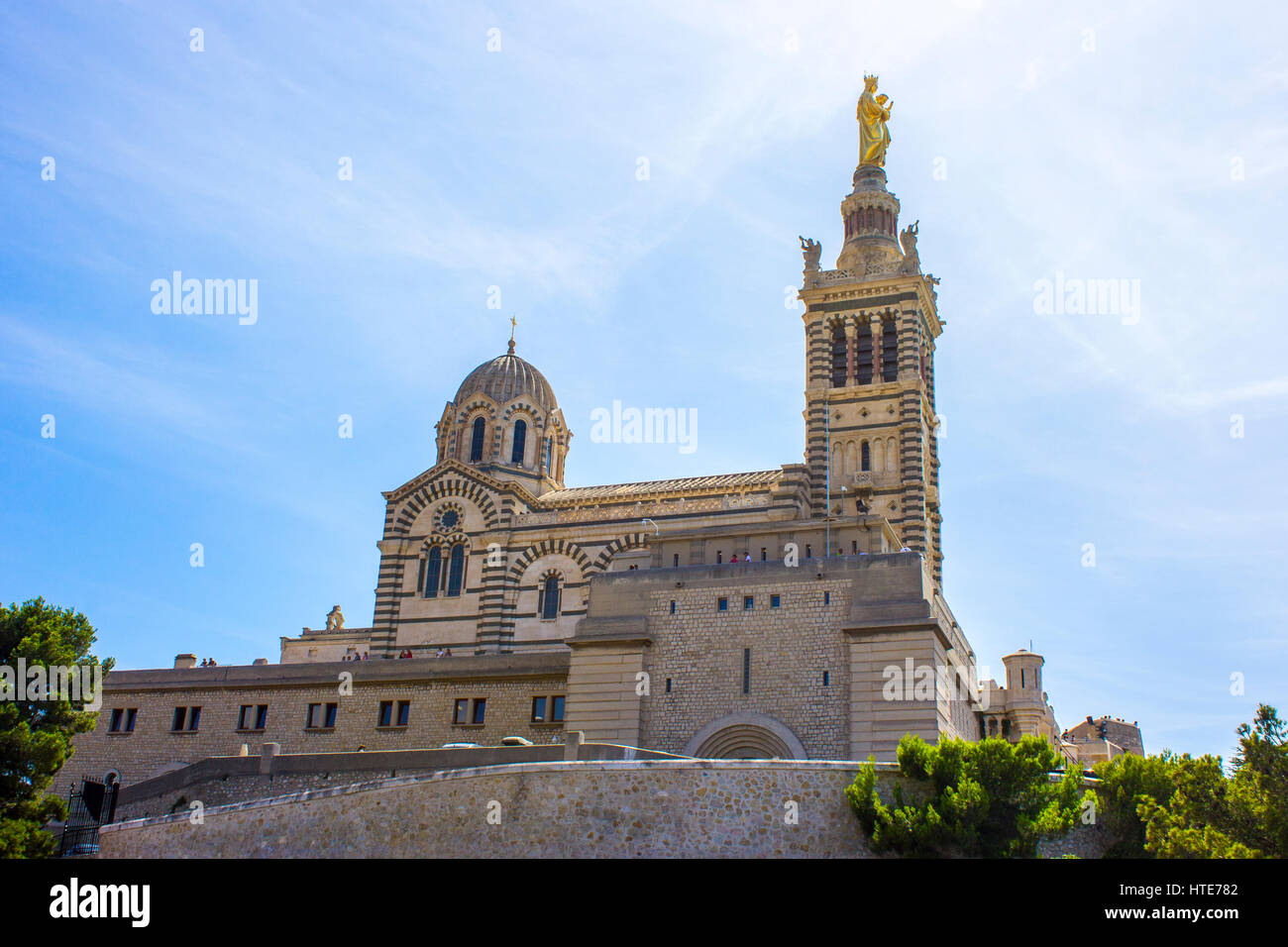 Notre-Dame de la Garde (Our Lady of the Guard), a Catholic basilica and pilgrimage site in Marseille, France,and the city's best-known symbol. Stock Photo