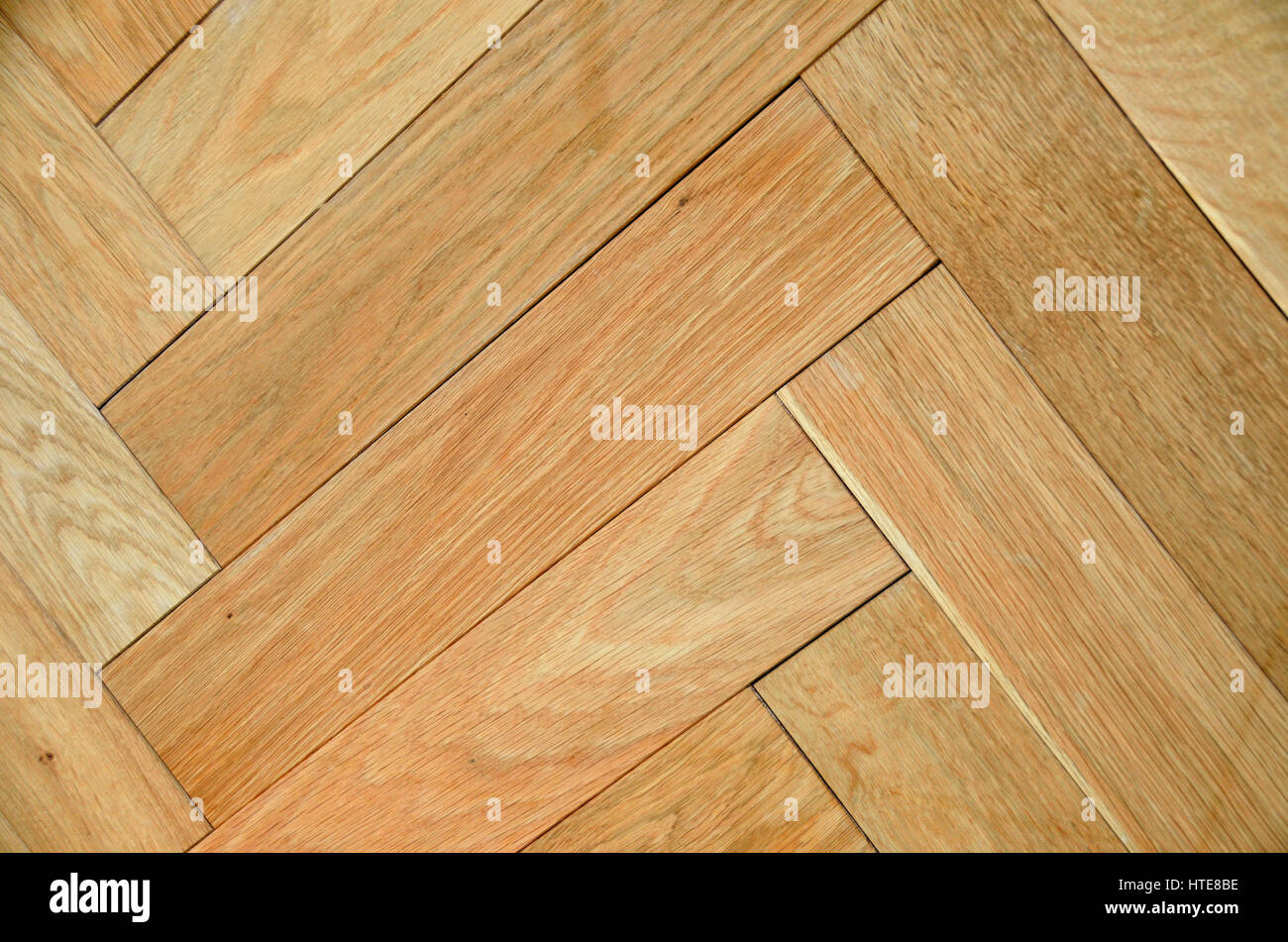 Tiled wooden flooring close-up. Stock Photo