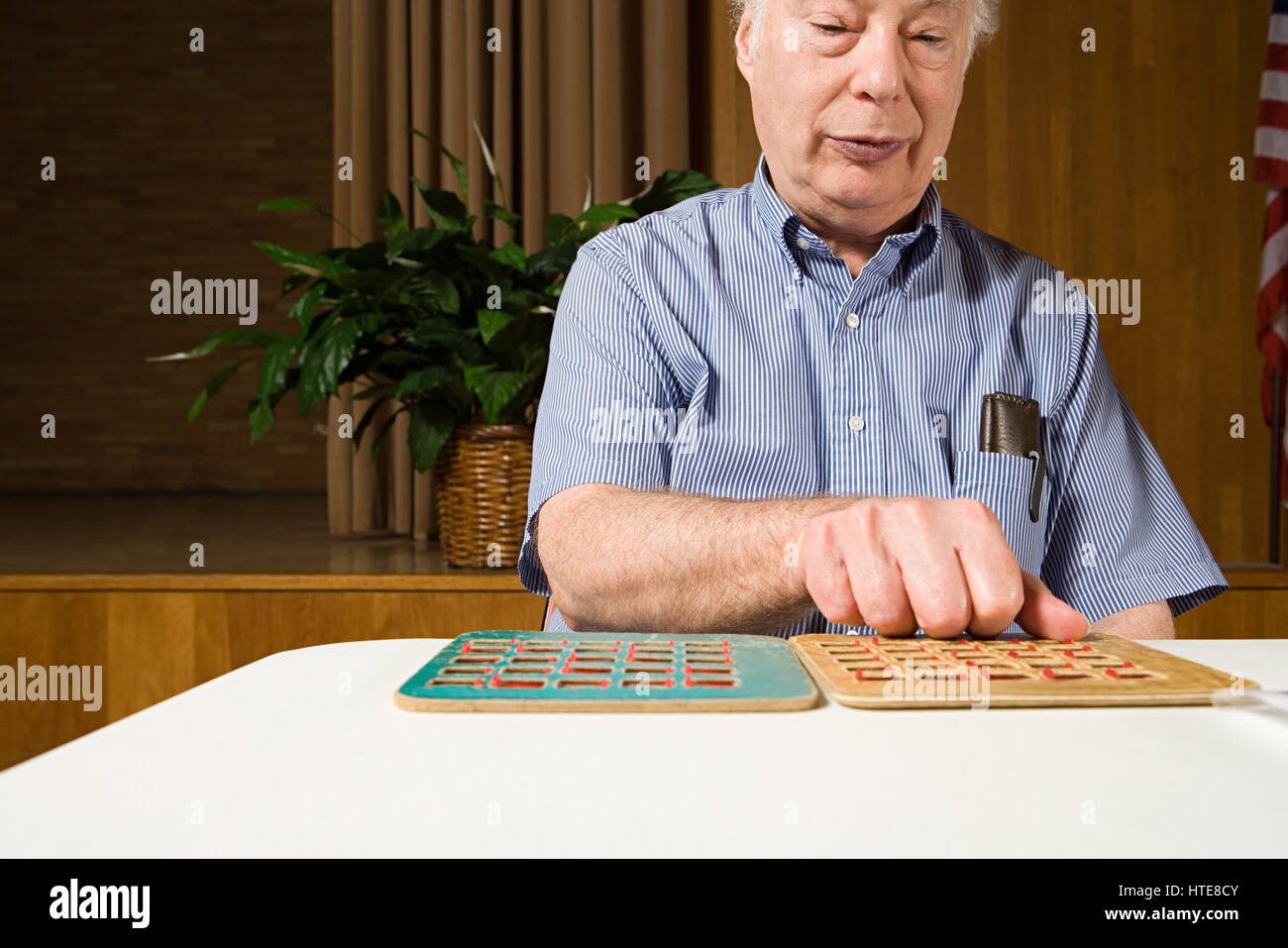 Senior man playing bingo Stock Photo - Alamy