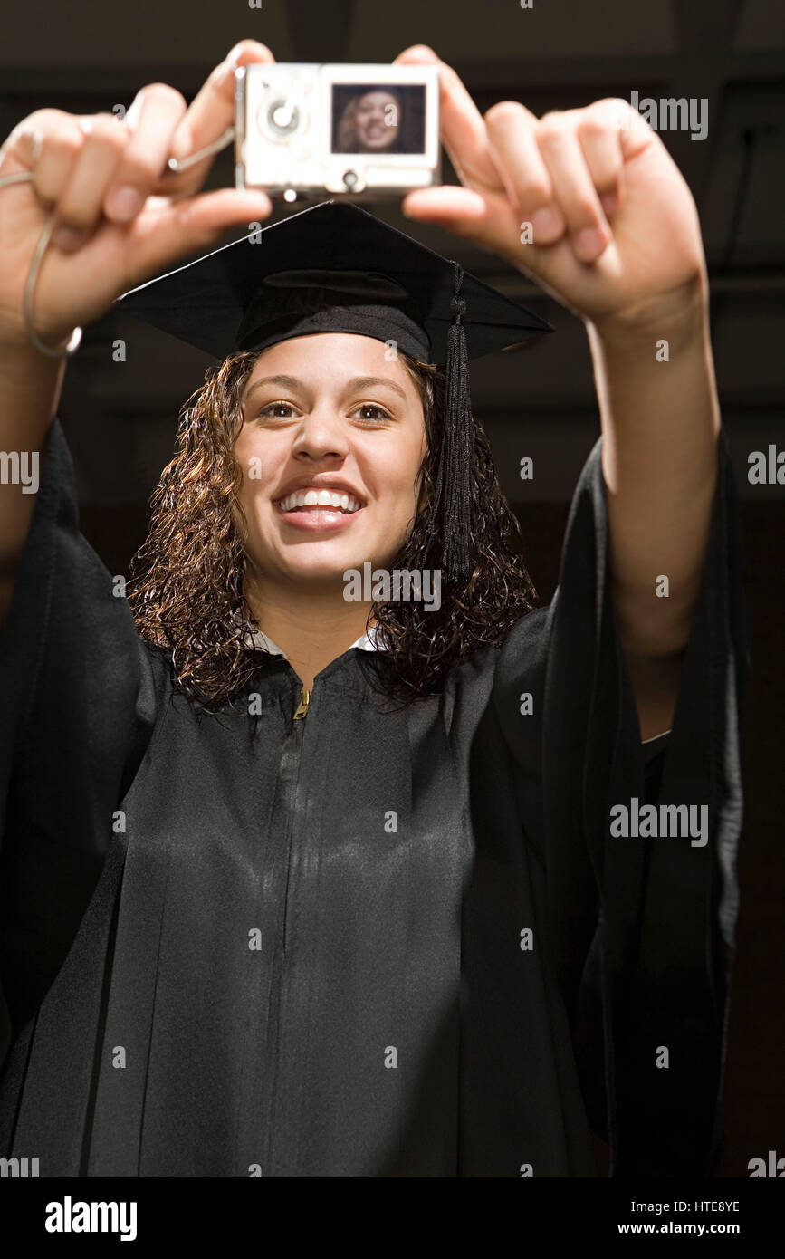 Female graduate taking a self portrait Stock Photo - Alamy