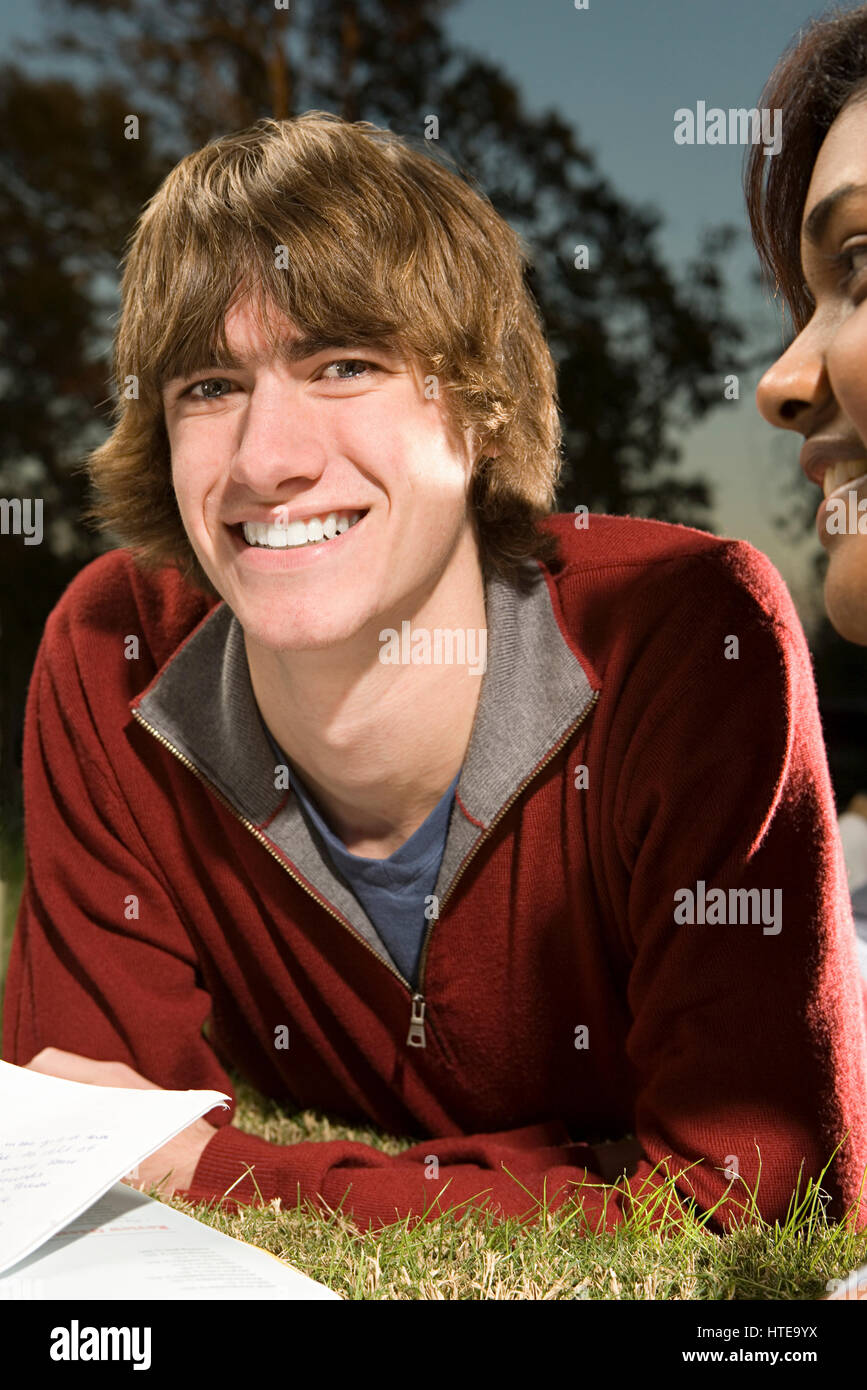 Two students studying outdoors Stock Photo - Alamy
