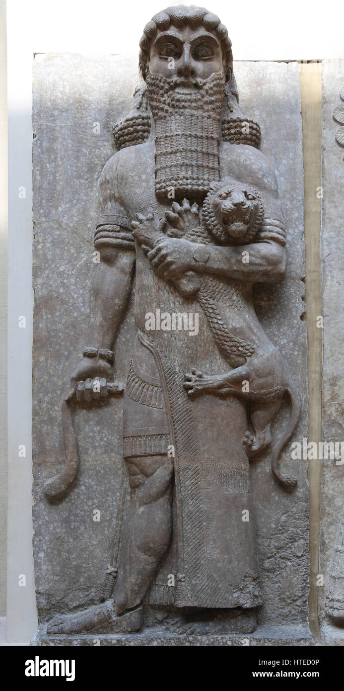 The hero overpowering a lion (identified with Gilgamesh). Palace of Sargon II. Assyrians.  Throne room. Assyrians. 721-705 BC. Khorsabad Palace. Louvr Stock Photo