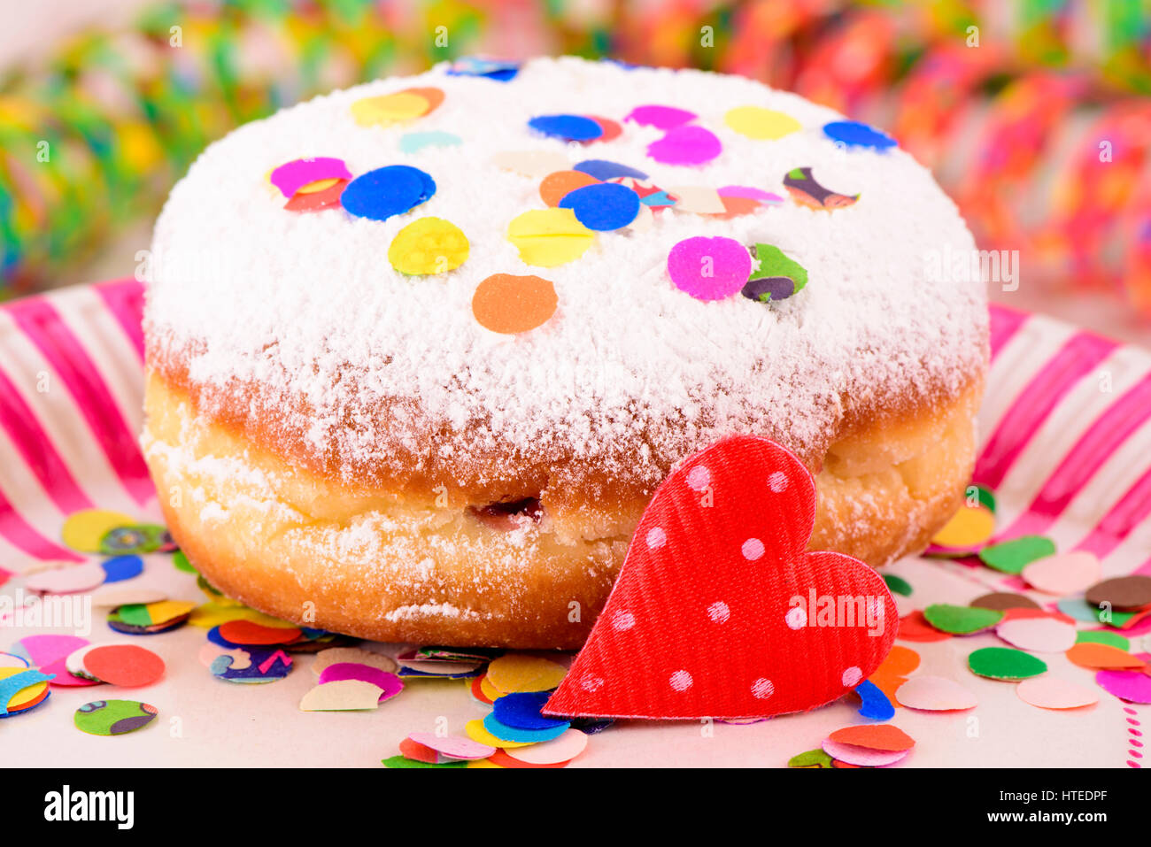sweet donut with confetti at carnival Stock Photo Alamy