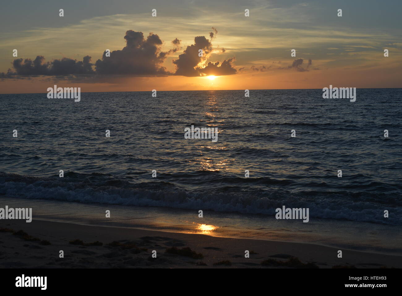 beach sunrise over Atlantic ocean Stock Photo - Alamy