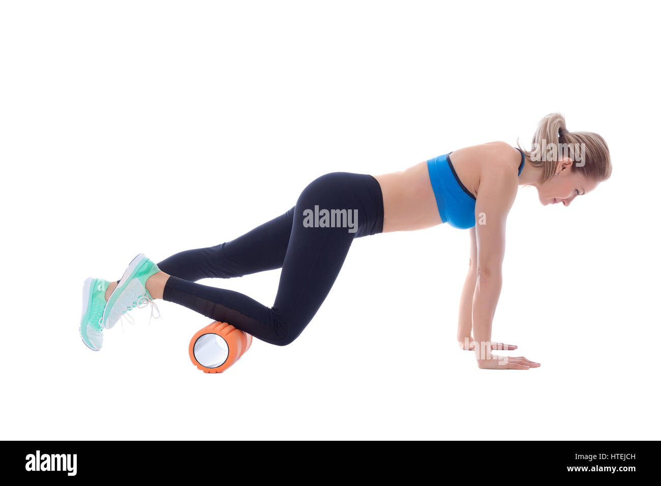Foam roller exercise explanation and execution with a trainer Stock ...